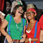 Two women dressed as Luigi and Mario