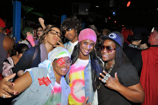 Five black women at a Halloween costume party
