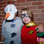 People dressed as Olaf from Frozen and Batman's sidekick Robin