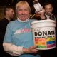 Woman collecting donations at Capital Pride Reveal