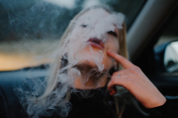 Woman smoking a vape
