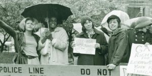 Marsha P Johnson and Silvia Rivera standing in the rain