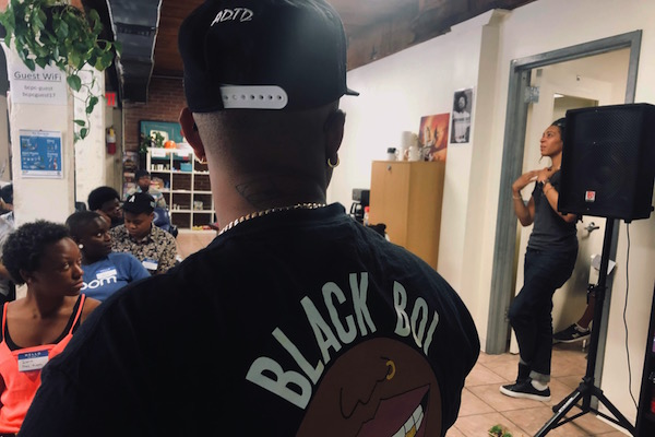 Attendee with Black Boi black shirt