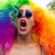 Woman at pride with rainbow wig