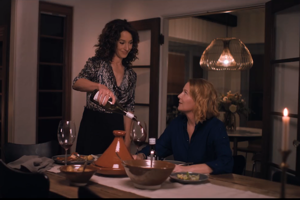 Bette and Tina have wine