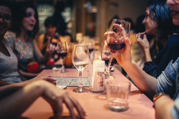 Women drinking wine and talking