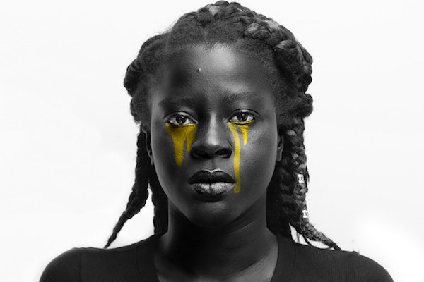 Woman crying yellow tears