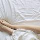 Woman's legs in bed