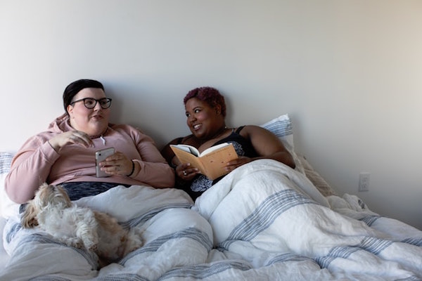 Queer couple in bed