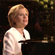 Kate McKinnon singing Hallelujah as Hillary Clinton on SNL in white suit at piano