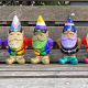 5 gnomes painted in lgbtq pride colors