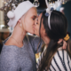two girls kissing at christmas party