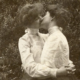 two women from the early 20th century kissing