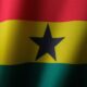 The national flag of Ghana. It is a horizontal triband of red, yellow, and green. In the middle there is a solid black star.