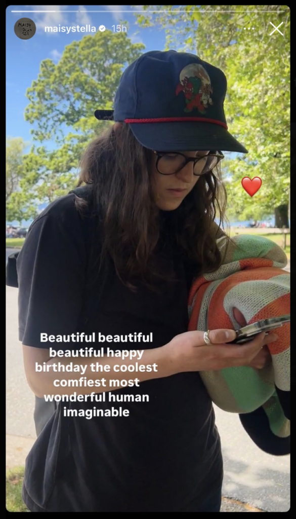 A screenshot of Maisy Stella's IG story, showing Bella Ramsey and the words "Beautiful beautiful beautiful, happy birthday the coolest, comfiest, most wonderful human imaginable" with a heart emoji.