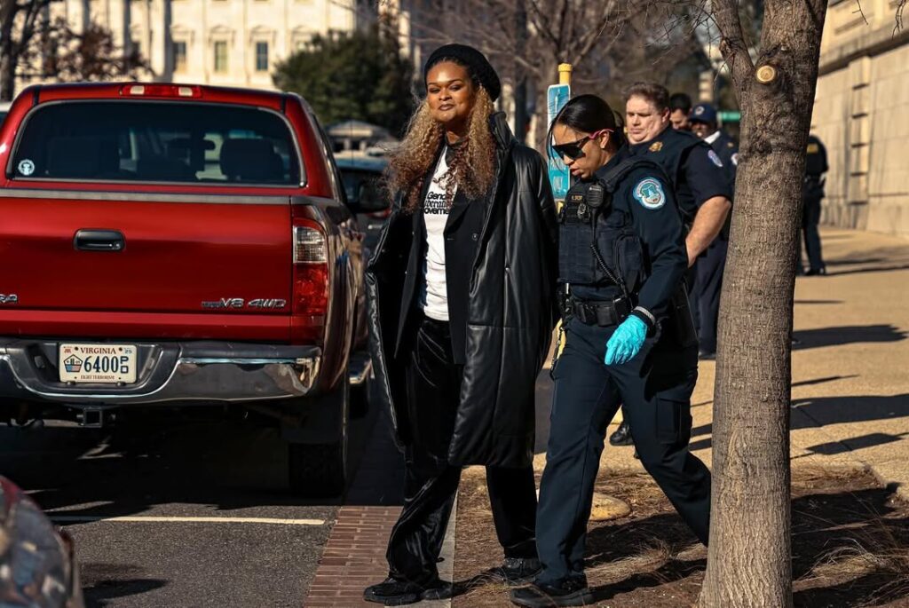 Activist Raquel Willis is arrested during the protest.