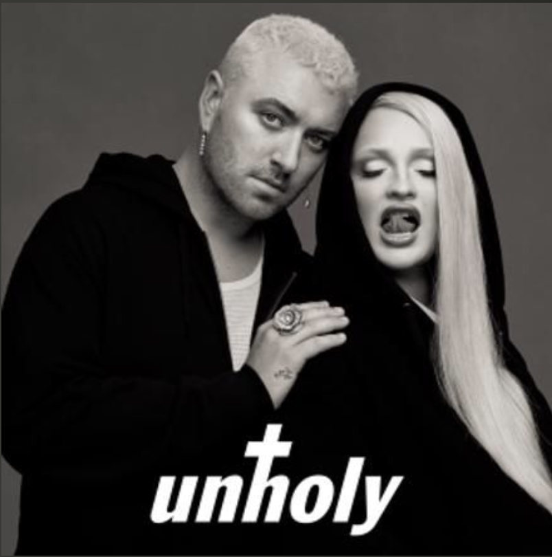 Sam Smith and Kim Petras pose together in a black and white photo. The word "Unholy" is on the bottom of the image.