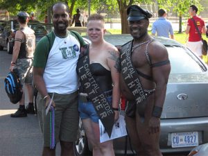Meeks poses with her fellow Mr. Capital Pride Leather 2009 and friend. 