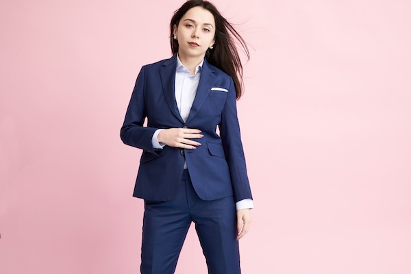 Woman in blue suit from Bindle and Keep